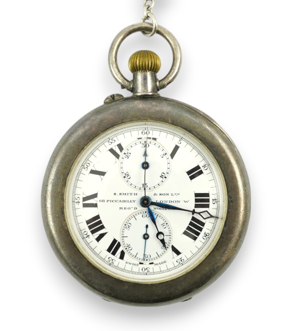 A George V silver open farce keyless pocket watch, by S. Smith & Son, with two subsidiary dials, case diameter 45mm, with a sterling chain. Condition - poor